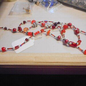 HandCrafted Necklace about 25"  ...… red, white, silver and small black beads …